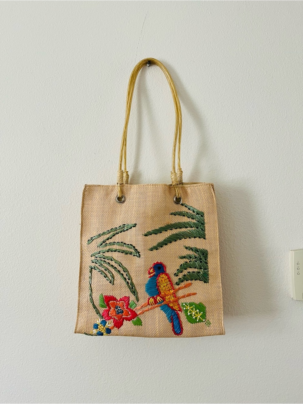 Hand-Embroidered Beige Jute Tote Bag with Colorful Parrot